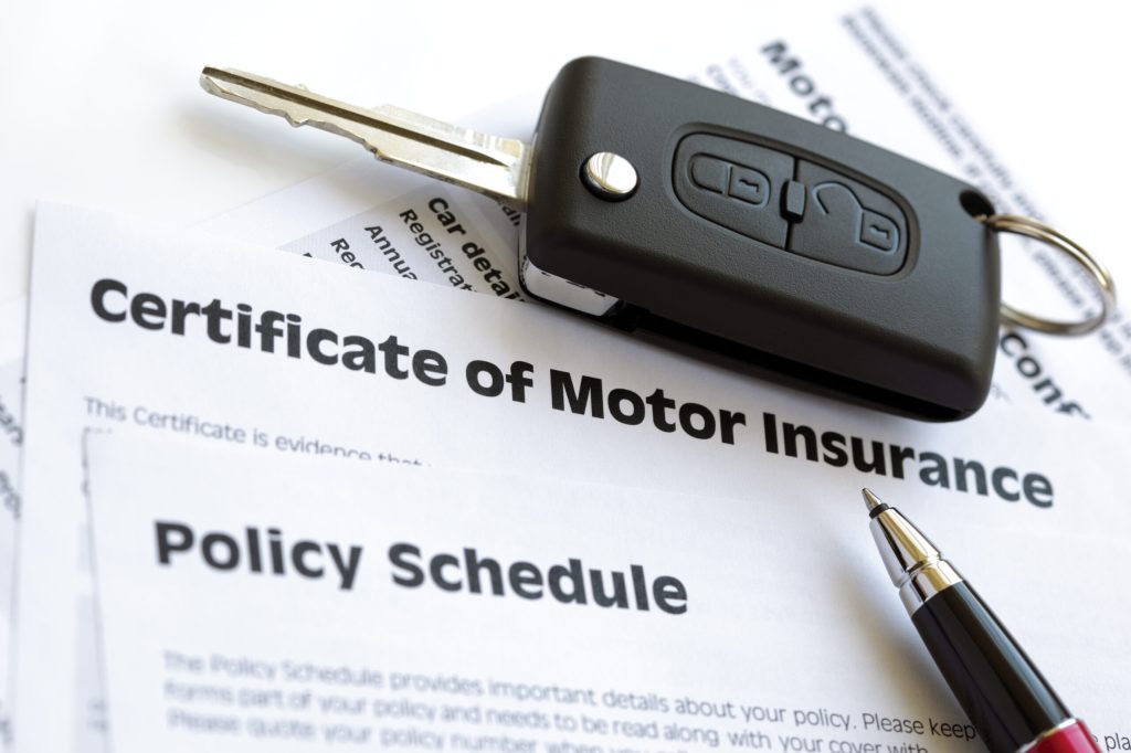 Certificate,Of,Motor,Insurance,And,Policy,Schedule,With,Car,Key