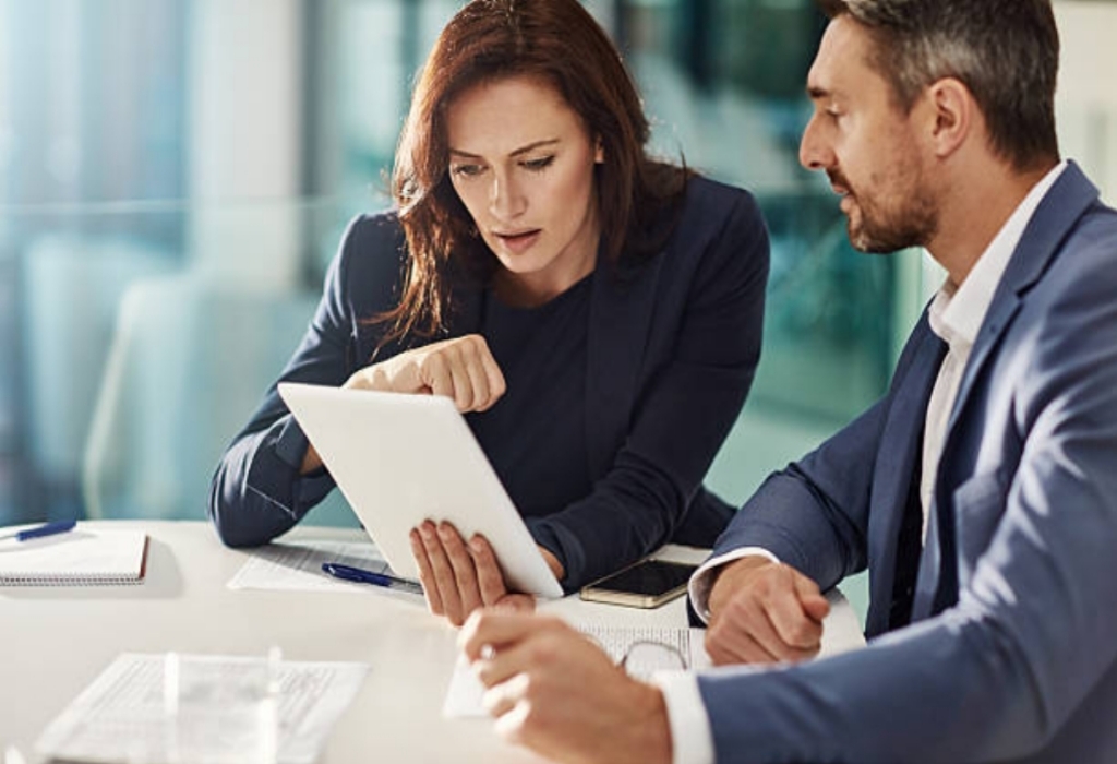 Cropped shot of two businesspeople meeting in the office